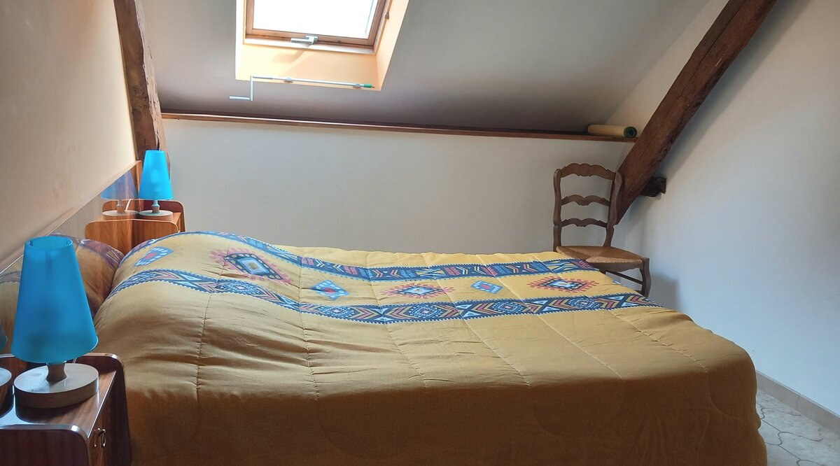 Chambre parental de la Haute Paponie avec lit double
